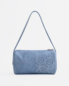 Blue handbag with a brand logo on a light gray background