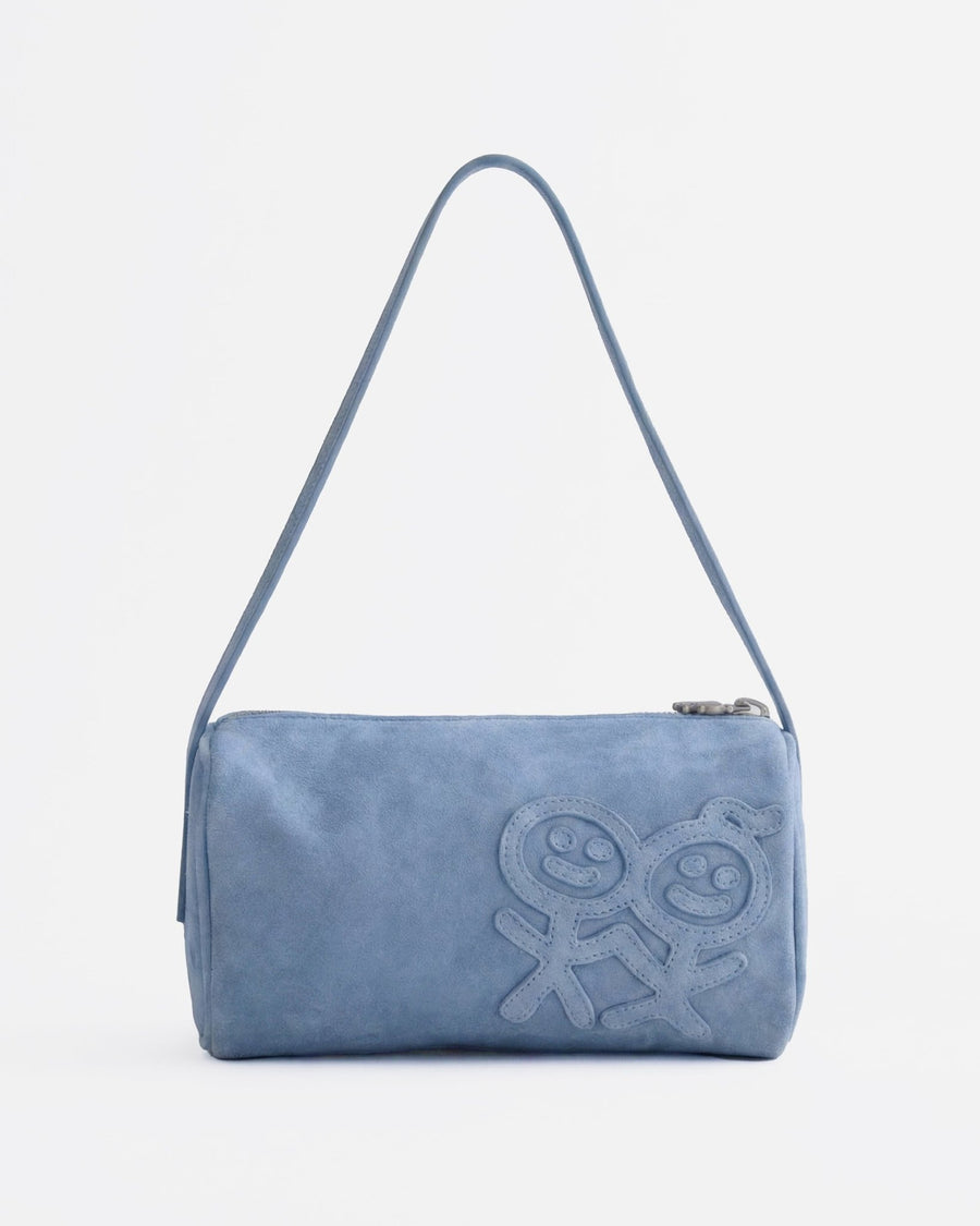 Blue handbag with a brand logo on a light gray background