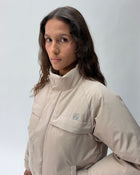 The Puffer Jacket (Trench) in Oat Milk 04